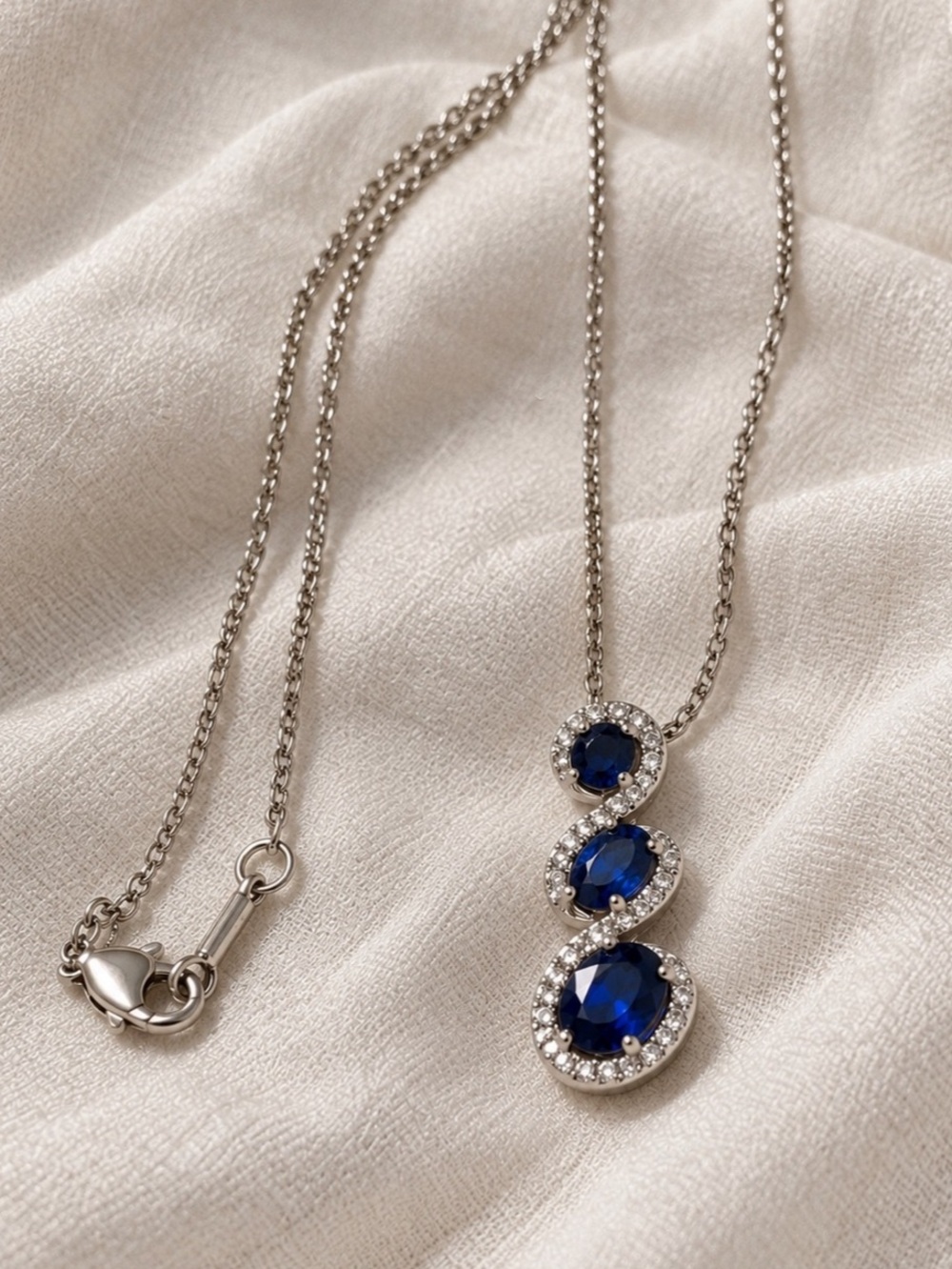 Sterling Silver Blue Crystal Swirl Pendant Necklace – 18”